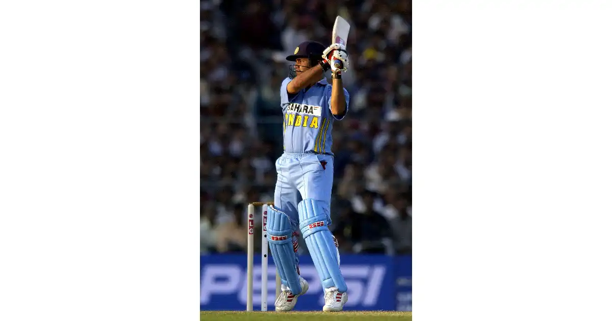 Dinesh Mongia playing a batting shot for India in an ODI.